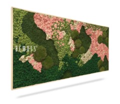 A rectangular art piece by BEMOSS featuring a textured, multicolored moss design. The vibrant arrangement includes green, pink, and white sections forming an abstract pattern within a wooden frame. The Moss Art BEMOSS® ORTHO PINK logo is displayed on the left side of the artwork.